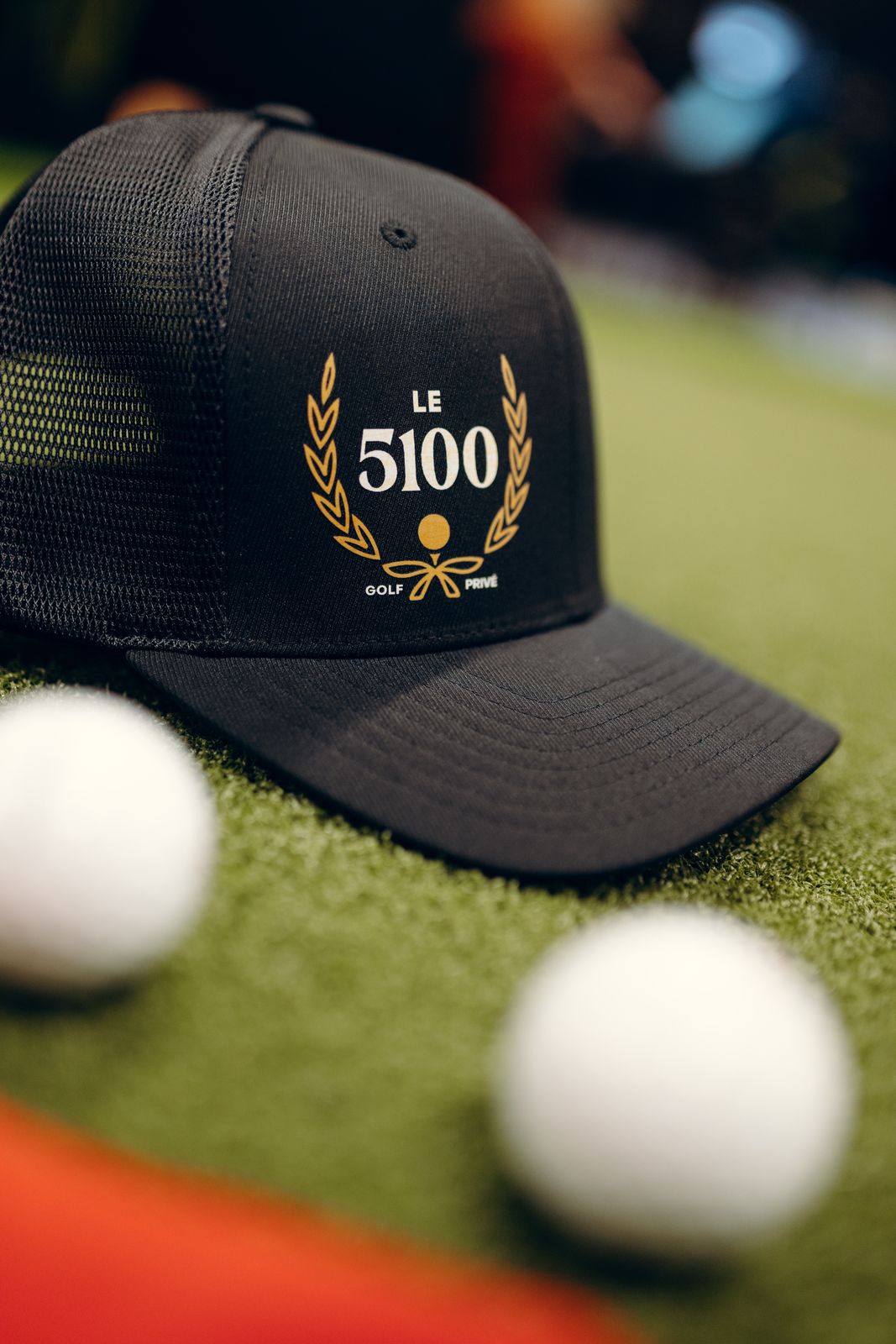 Casquette Le 5100 et balles de golf